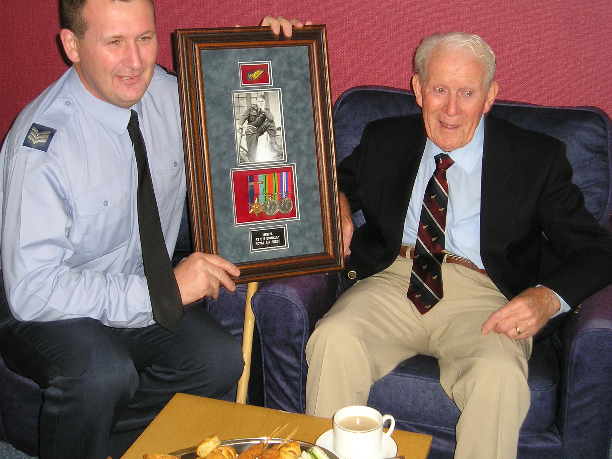 Derek Brinkley receiving award